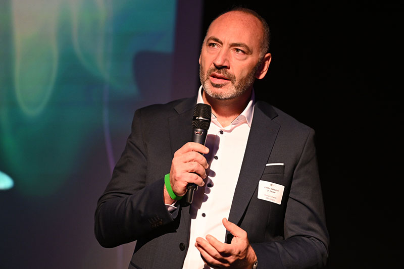 AI keynote speaker presenting on AI in media and innovation